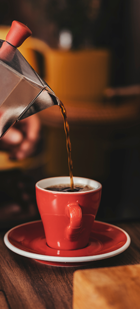 Fresh coffee poured into a cup